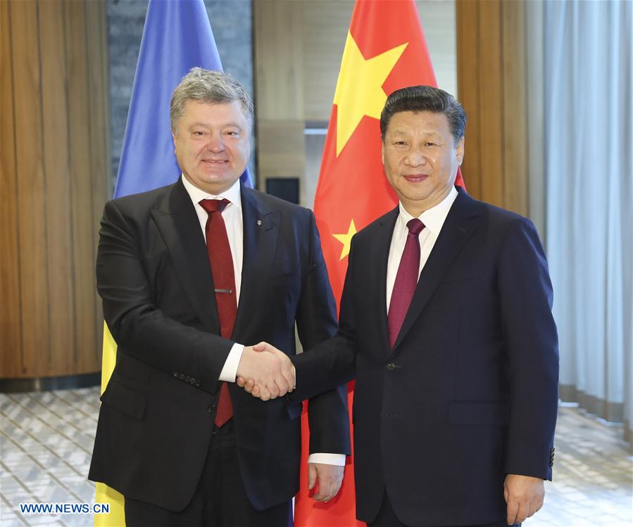 SWITZERLAND-DAVOS-CHINA-XI JINPING-POROSHENKO-MEETING 