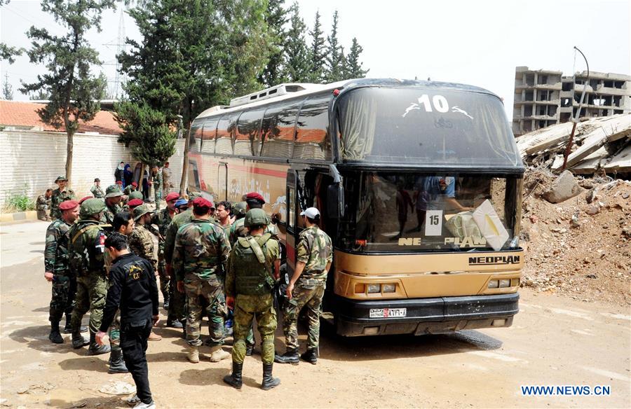 SYRIA-DAMASCUS-REBEL-EVACUATION