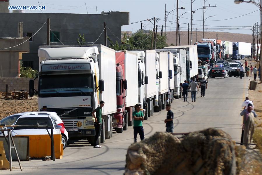 JORDAN-MAFRAQ-HUMANITARIAN AID-SYRIA-BORDER-REFUGEES