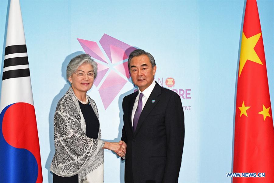 SINGAPORE-CHINA-SOUTH KOREA-WANG YI-KANG KYUNG-WHA-MEETING