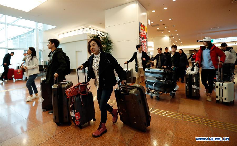 (SP)JAPAN-TOKYO-FIGURE SKATING-WORLD CHAMPIONSHIPS-TEAM CHINA-ARRIVAL