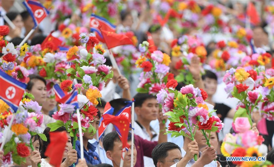 DPRK-PYONGYANG-XI JINPING-PEOPLE-WELCOME