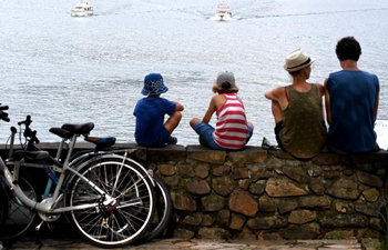 Tourists visit scenic spot of Riyue Tan in SE China's Taiwan