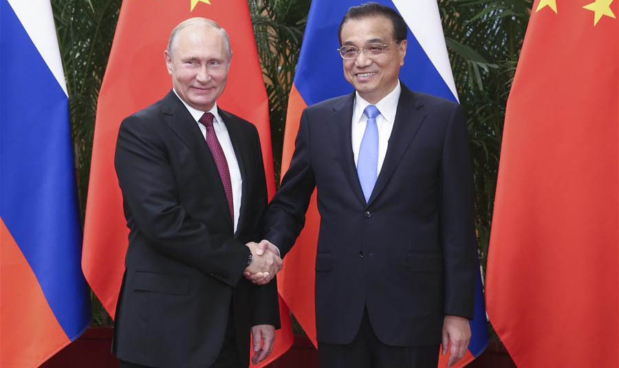 Premier Li meets Putin on closer economic ties