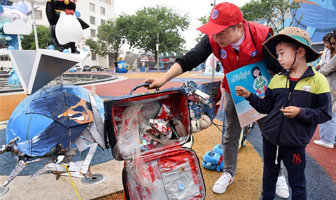 Themed art exhibition held in Qingdao to greet upcoming World Oceans Day